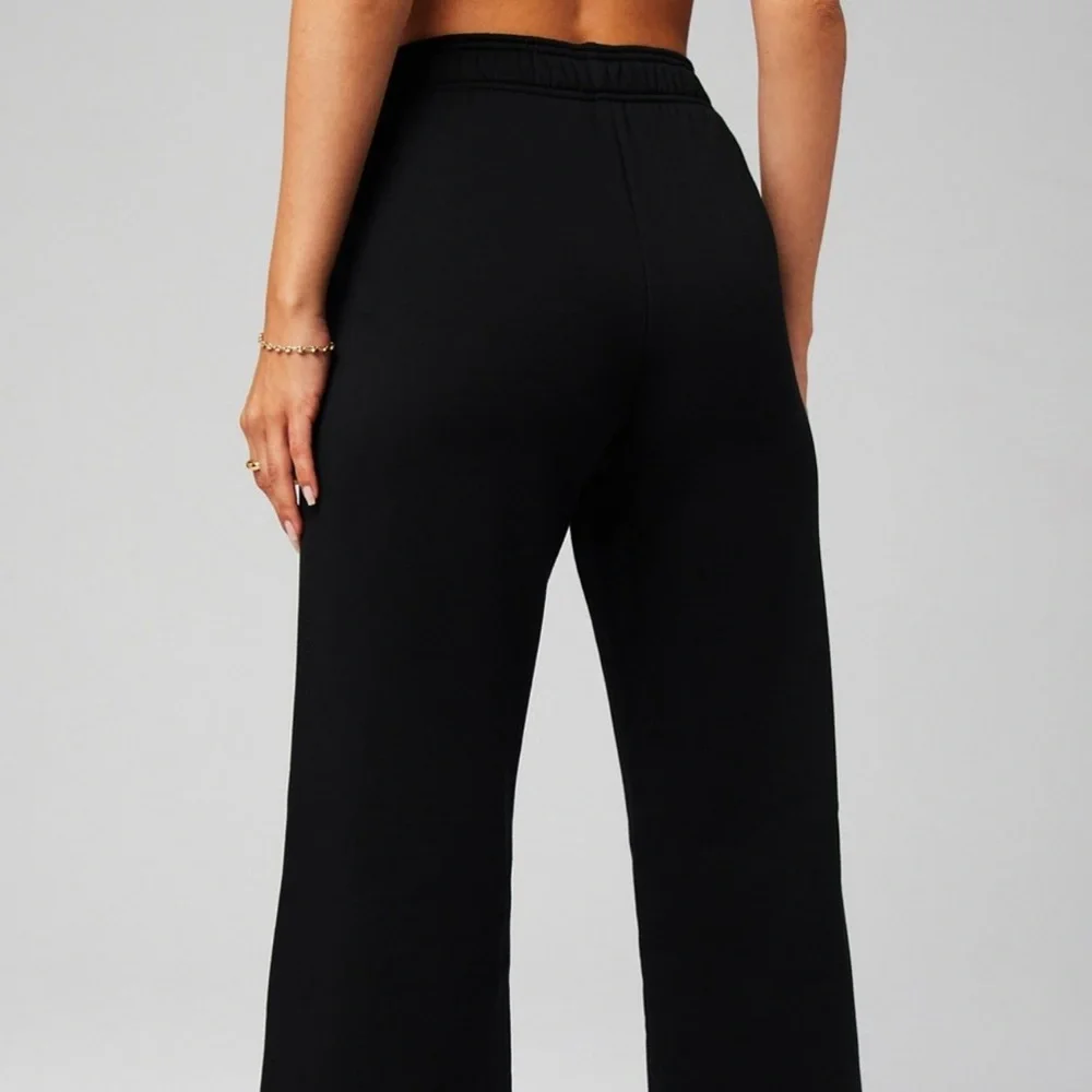 Fabletics Cozy Fleece Wide Leg Sweatpant in Black - Picture 3 of 8